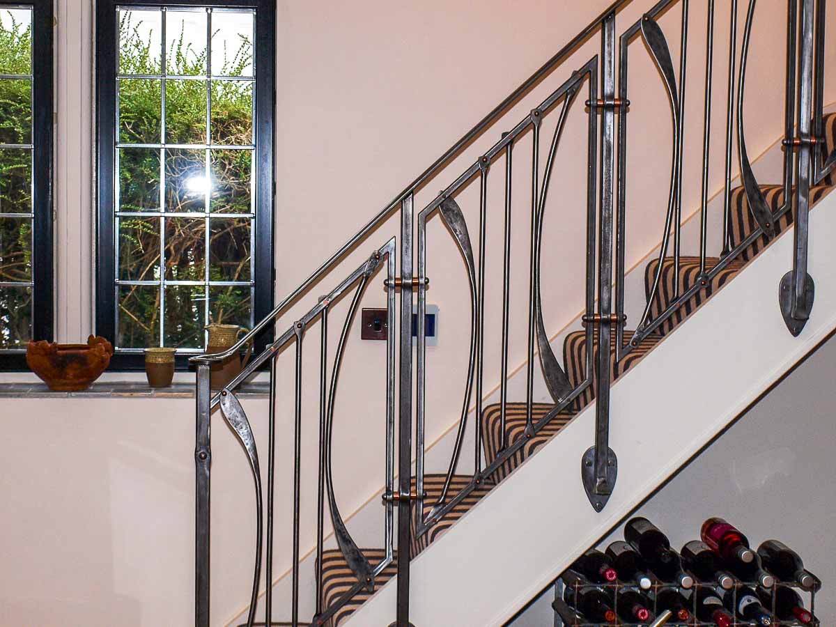 Arts and Crafts Inspired Wrought Iron Stair Balustrade